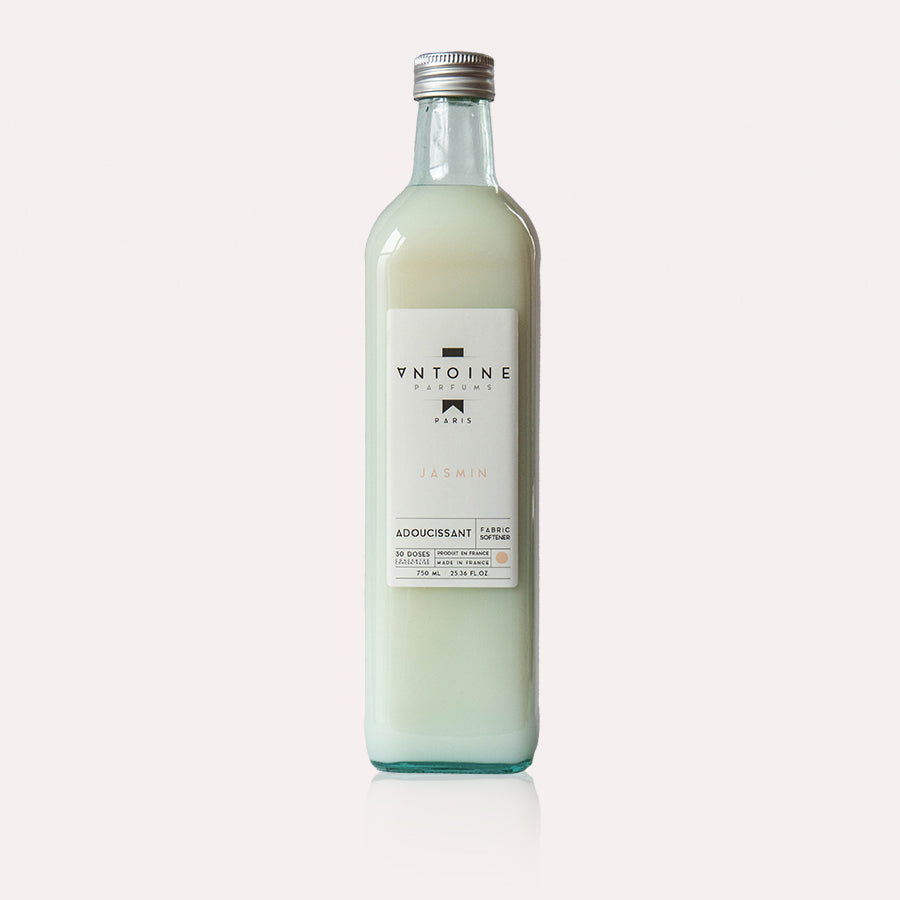 A standalone Antoine Parfums Jasmin fabric softener bottle on a clean white background, emphasizing the bottle's minimalist design.