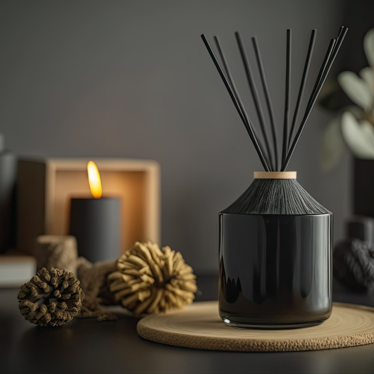 Stylish aroma reed diffuser with candles – Harmony Boutiq home fragrance creating a calm and elegant atmosphere.