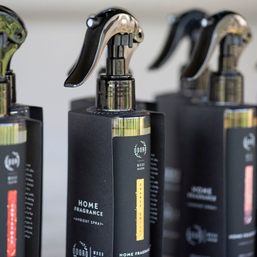 ODORO Mood Collection Chili Orange spray bottle in a collection with other fragrances.