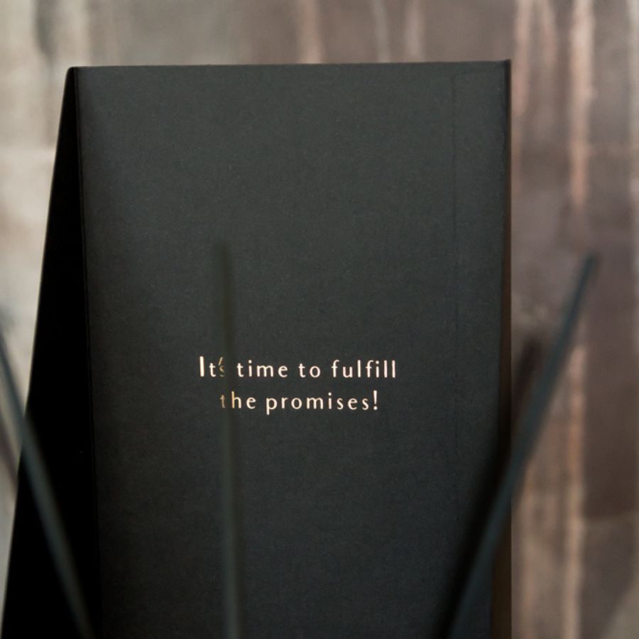 Luxury box opening to reveal the interior with the inscription 'It's time to fulfill the promises,' highlighting the elegant presentation and attention to detail.