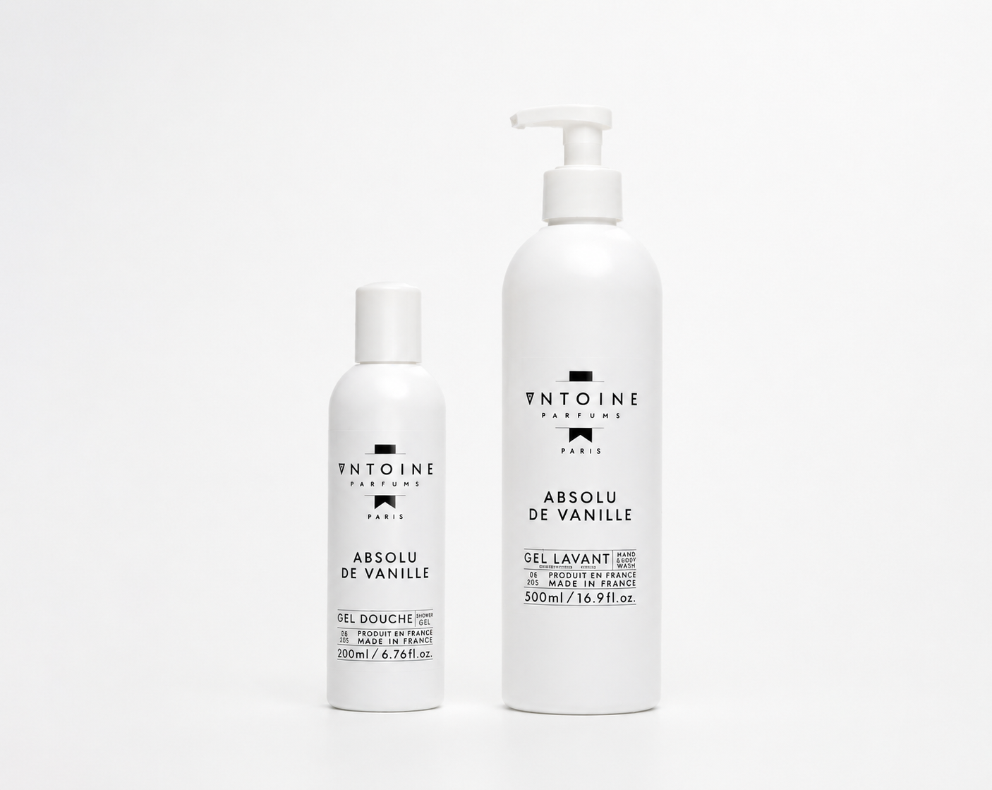 Two bottles of Entoine Absolu de Vanille on a white background