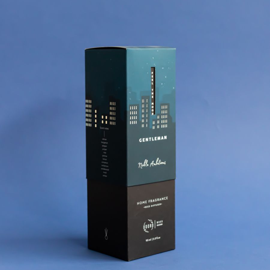 Close-up of Mood Collection Gentleman packaging box design, featuring a sleek blue and black color palette.