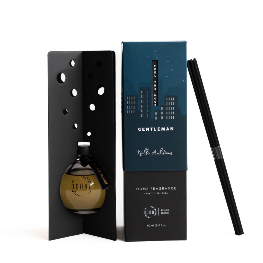 Mood Collection Gentleman reed diffuser with opened packaging box and fiber sticks, revealing the elegant design.