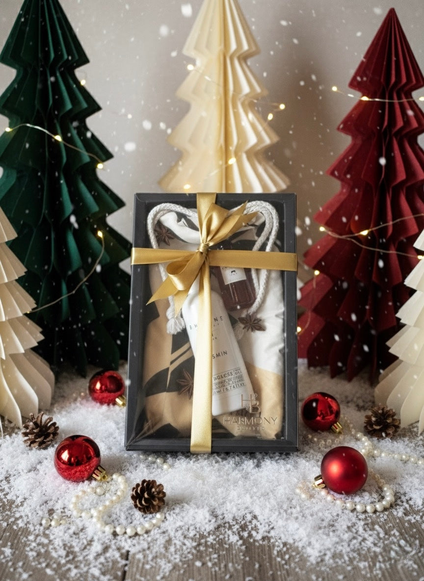 Harmony Boutiq gift set with Antoine Jasmin shower gel and Ecovera microfiber towel, elegant home & body gift on a festive background.