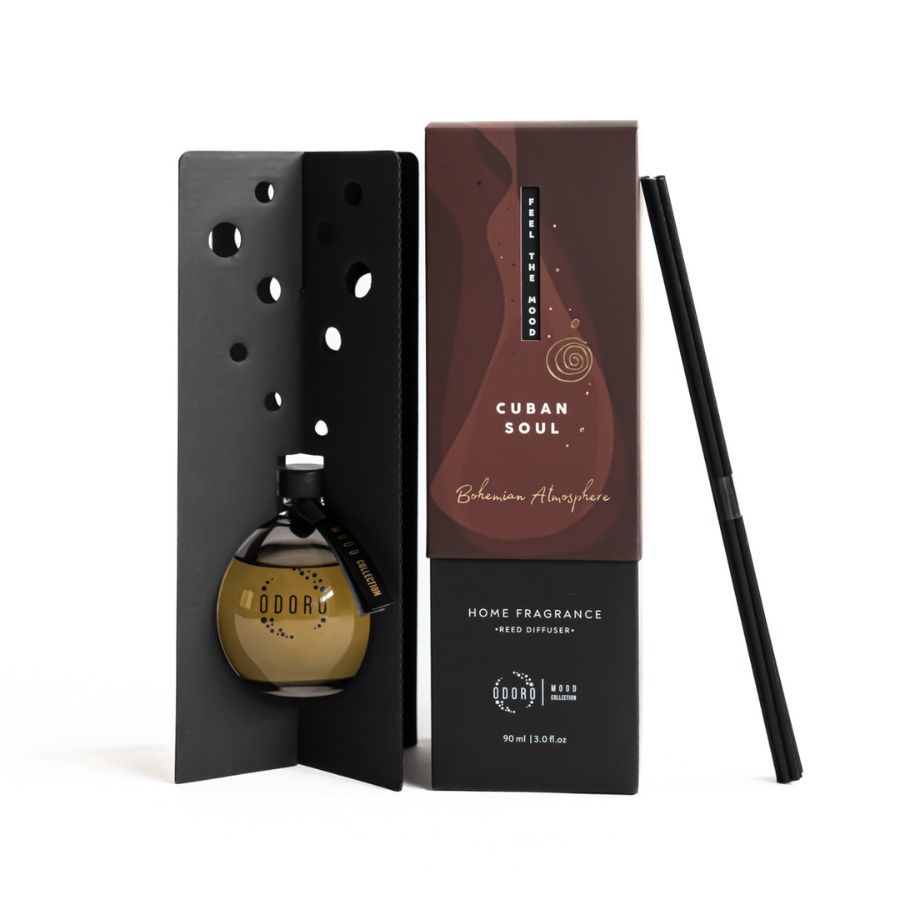 ood collection Cuban Soul reed diffuser with brown packaging and 90 ml aromatic oil, displayed with reed sticks and elegant packaging, perfect for filling spaces with a bohemian and luxurious fragrance.