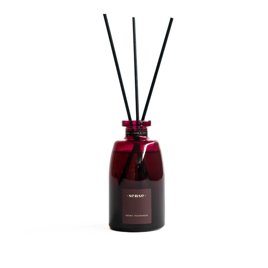 ODORO Sense Icon home diffuser with black reeds on a clean white background.