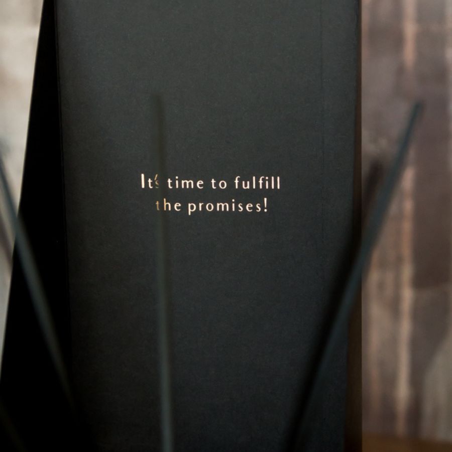 Luxury box opening to reveal the interior with the inscription 'It's time to fulfill the promises,' highlighting the elegant presentation and attention to detail.